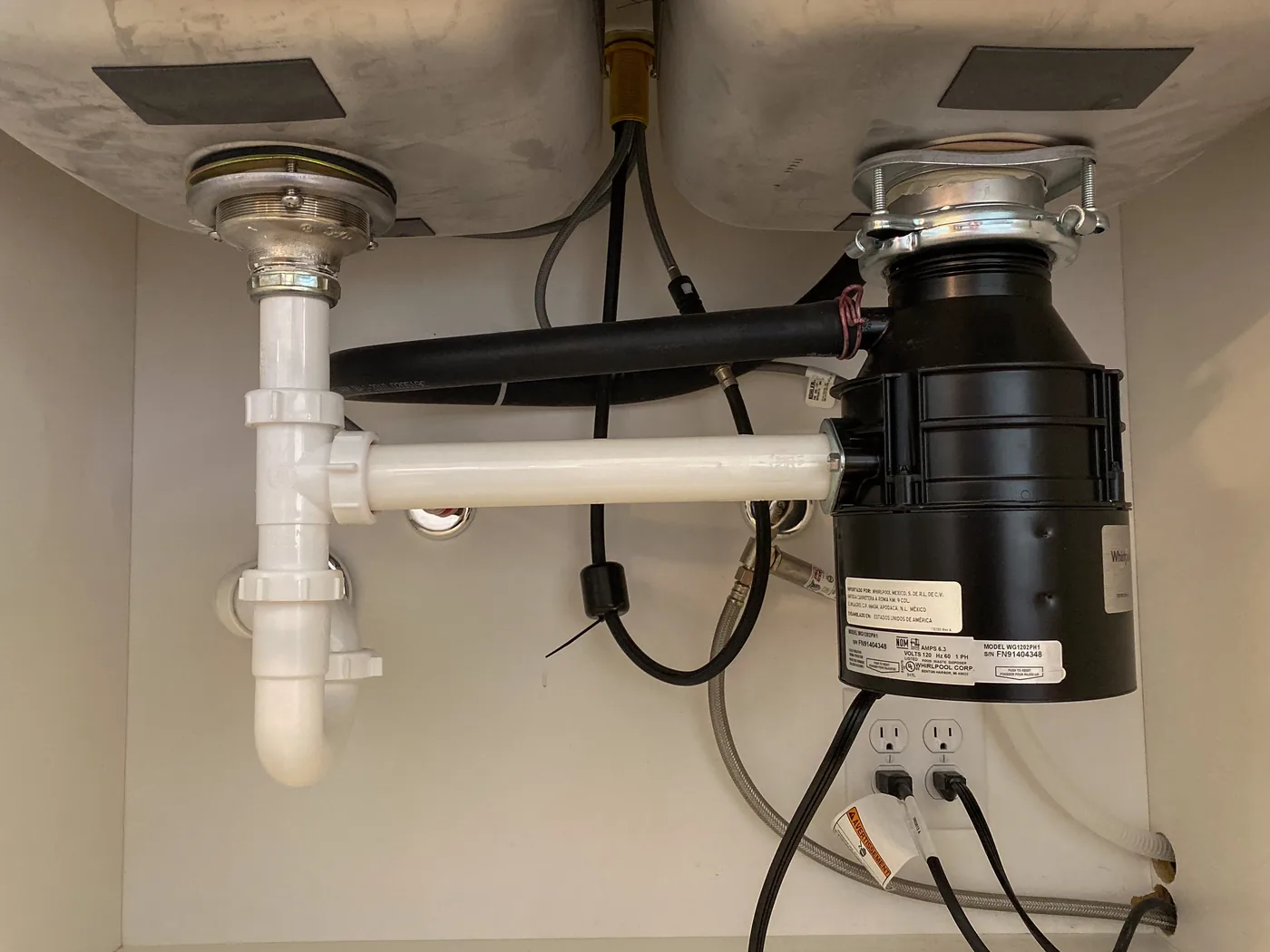 Garbage Disposal Leak in a Riverside home